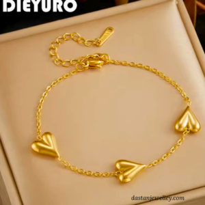 Front view of gold plated stainless steel heart charm bracelet with extender chain.